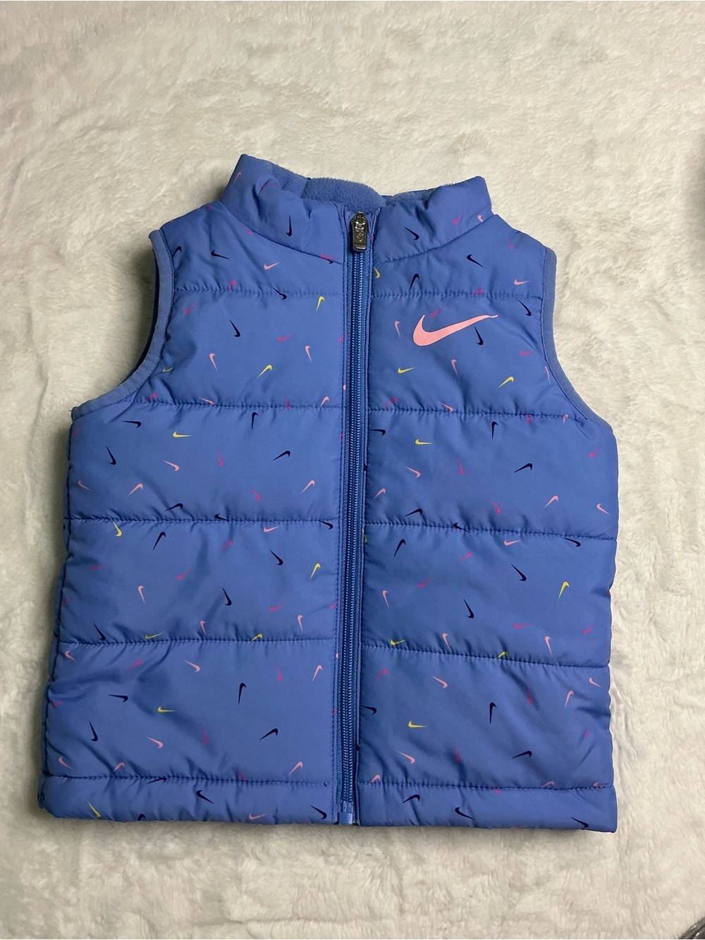 Nike Blue Puffer Vest with Pink Swoosh